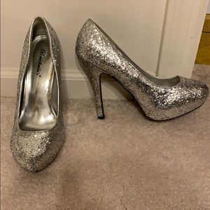 Shiny silver pumps